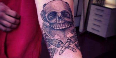 Skull Plugs Tattoo